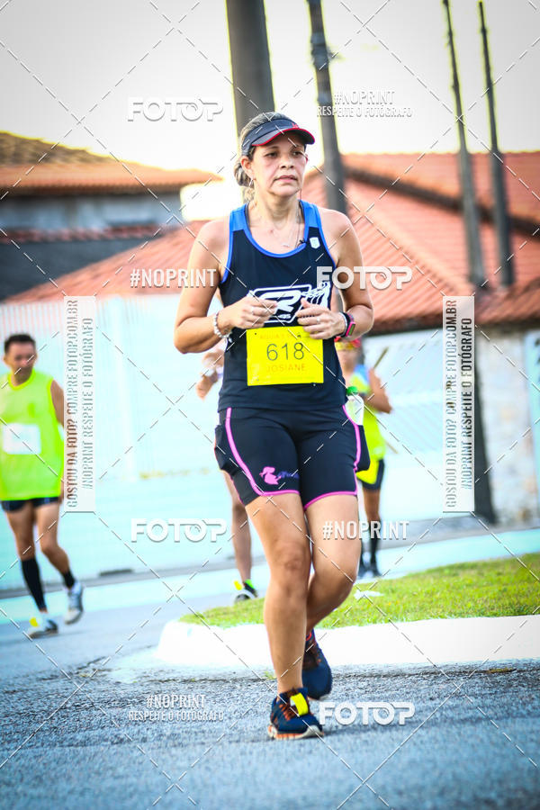 Buy your photos of the eventguia 13K Praia Grande on Fotop