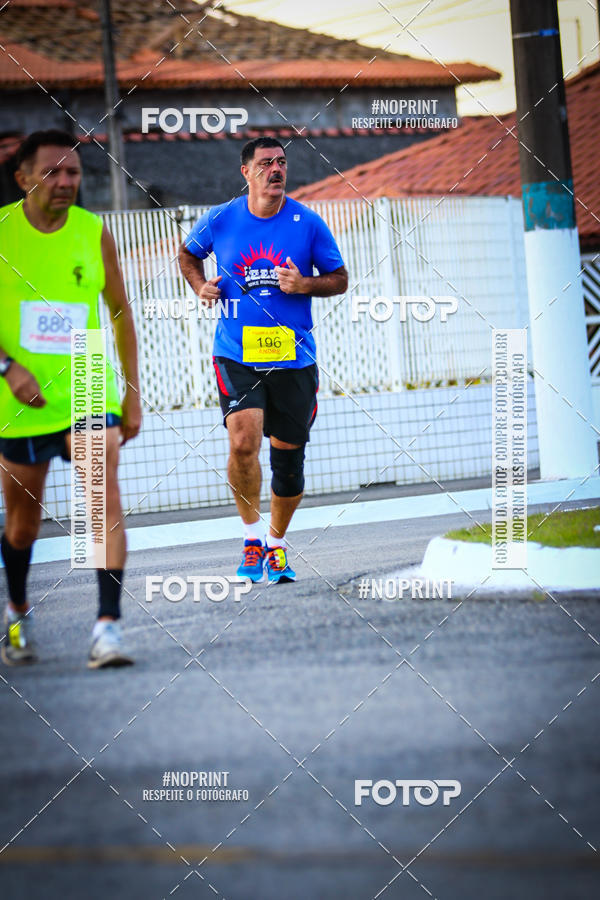 Buy your photos of the eventguia 13K Praia Grande on Fotop
