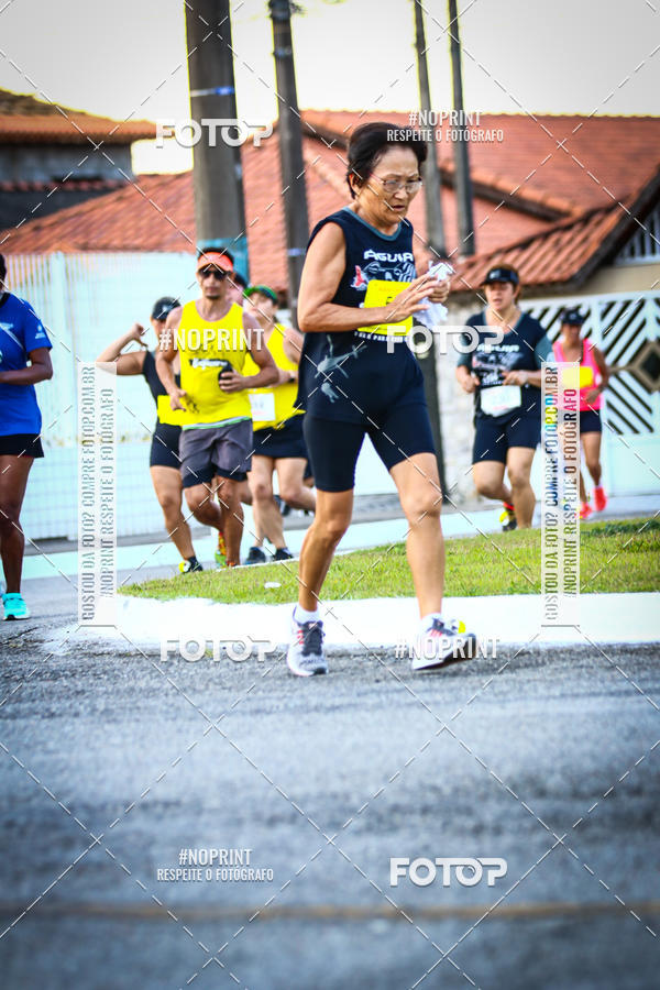 Buy your photos of the eventguia 13K Praia Grande on Fotop