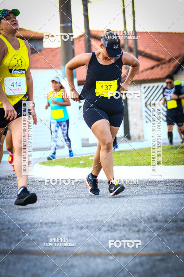 Buy your photos of the eventguia 13K Praia Grande on Fotop