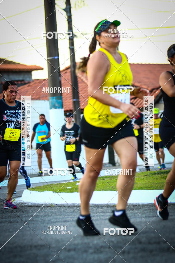 Buy your photos of the eventguia 13K Praia Grande on Fotop