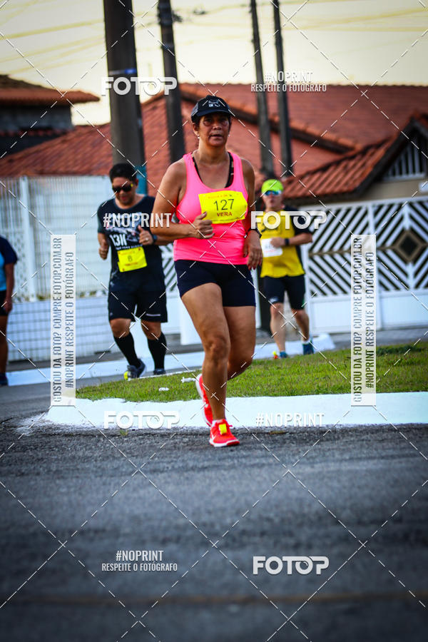 Buy your photos of the eventguia 13K Praia Grande on Fotop
