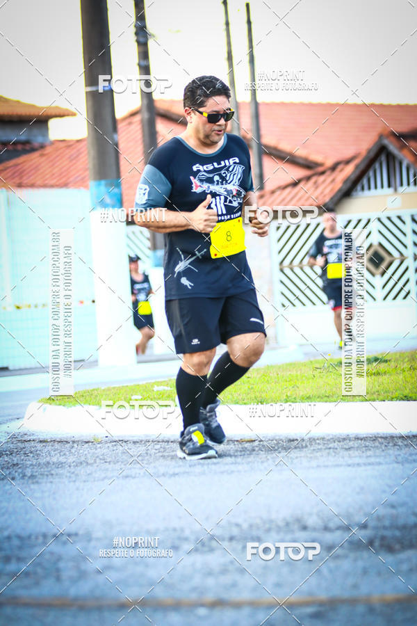 Buy your photos of the eventguia 13K Praia Grande on Fotop