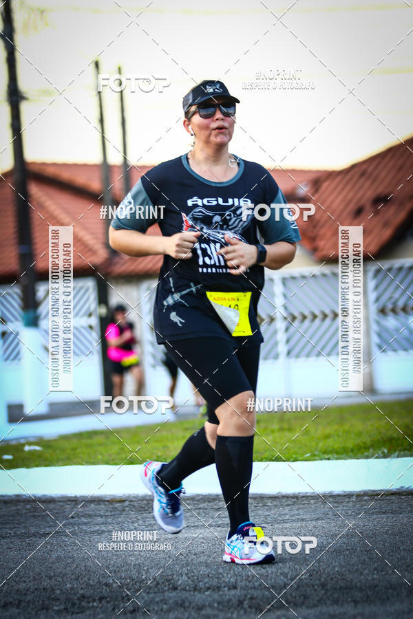 Buy your photos of the eventguia 13K Praia Grande on Fotop