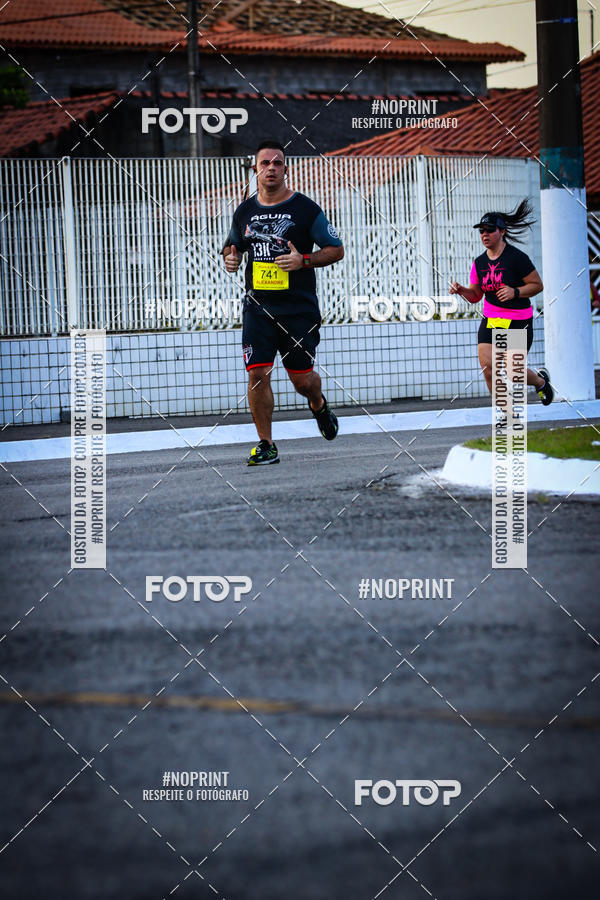 Buy your photos of the eventguia 13K Praia Grande on Fotop