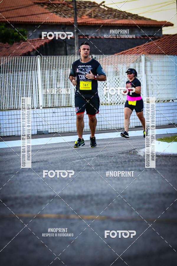 Buy your photos of the eventguia 13K Praia Grande on Fotop