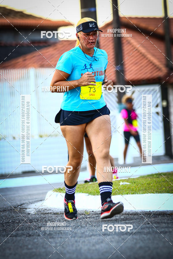 Buy your photos of the eventguia 13K Praia Grande on Fotop
