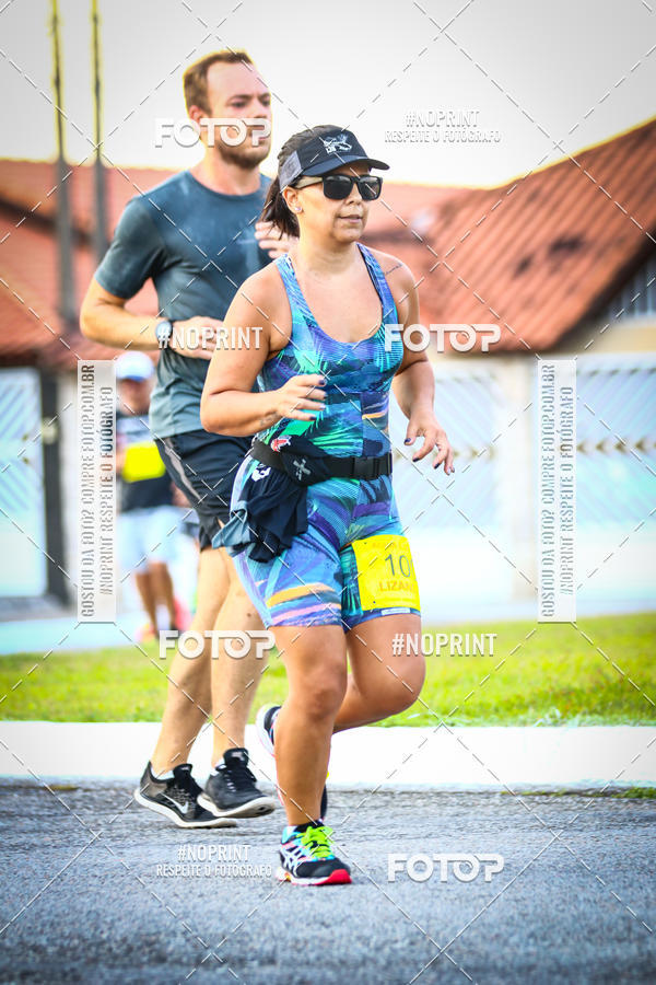 Buy your photos of the eventguia 13K Praia Grande on Fotop