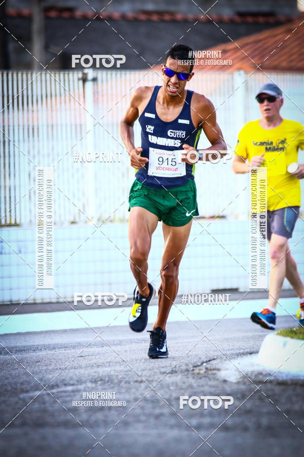Buy your photos of the eventguia 13K Praia Grande on Fotop