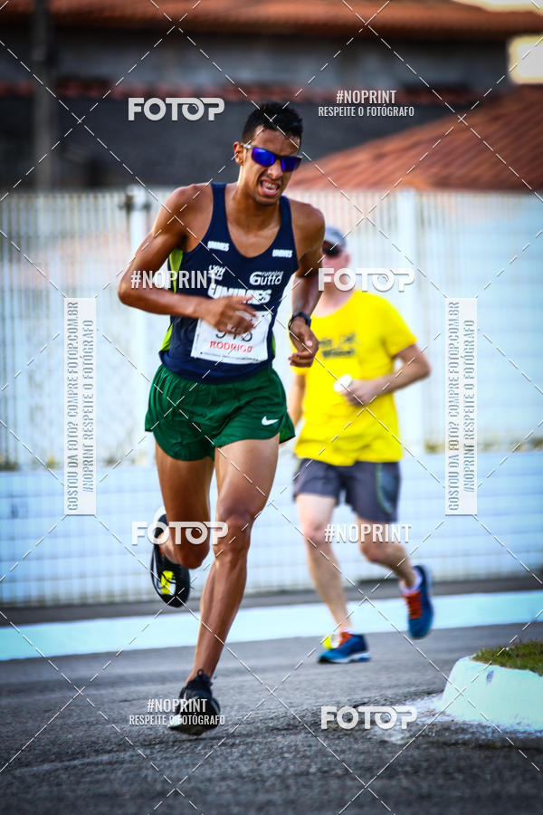 Buy your photos of the eventguia 13K Praia Grande on Fotop