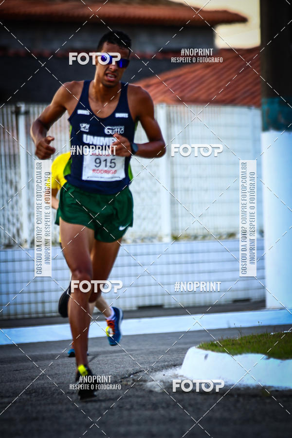 Buy your photos of the eventguia 13K Praia Grande on Fotop
