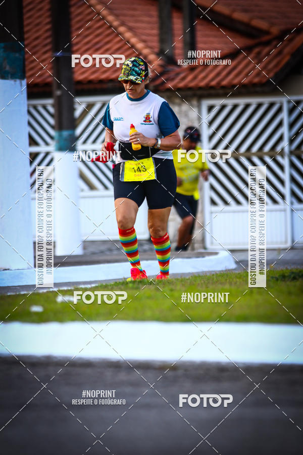 Buy your photos of the eventguia 13K Praia Grande on Fotop
