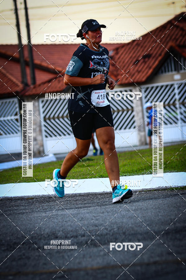 Buy your photos of the eventguia 13K Praia Grande on Fotop