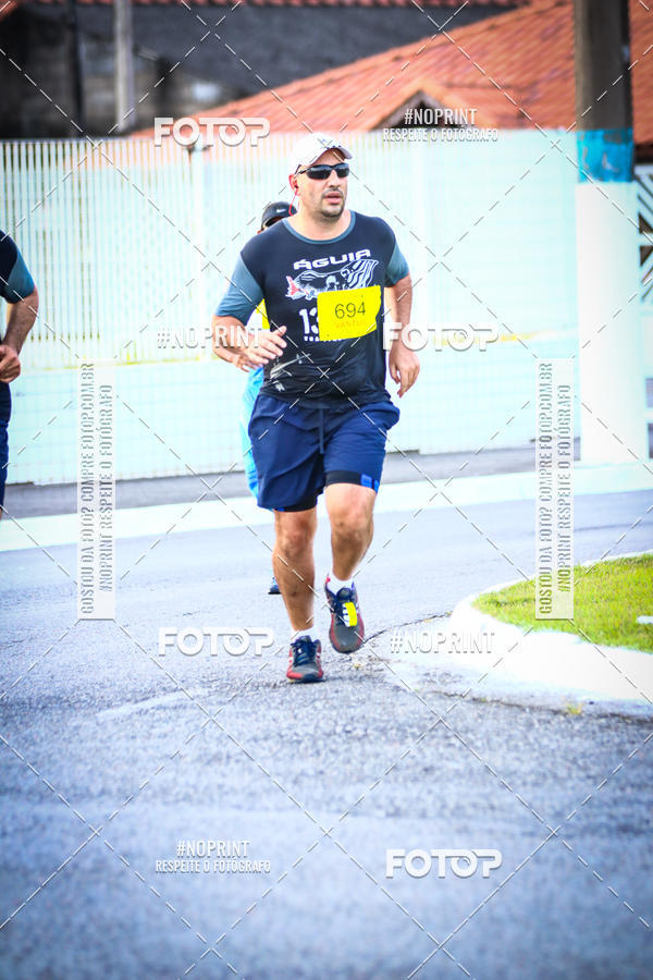 Buy your photos of the eventguia 13K Praia Grande on Fotop