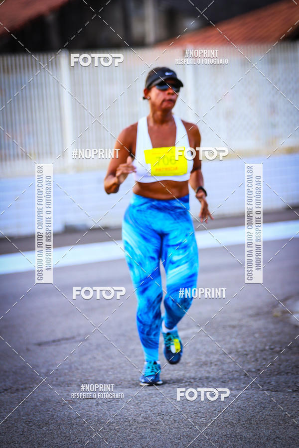 Buy your photos of the eventguia 13K Praia Grande on Fotop