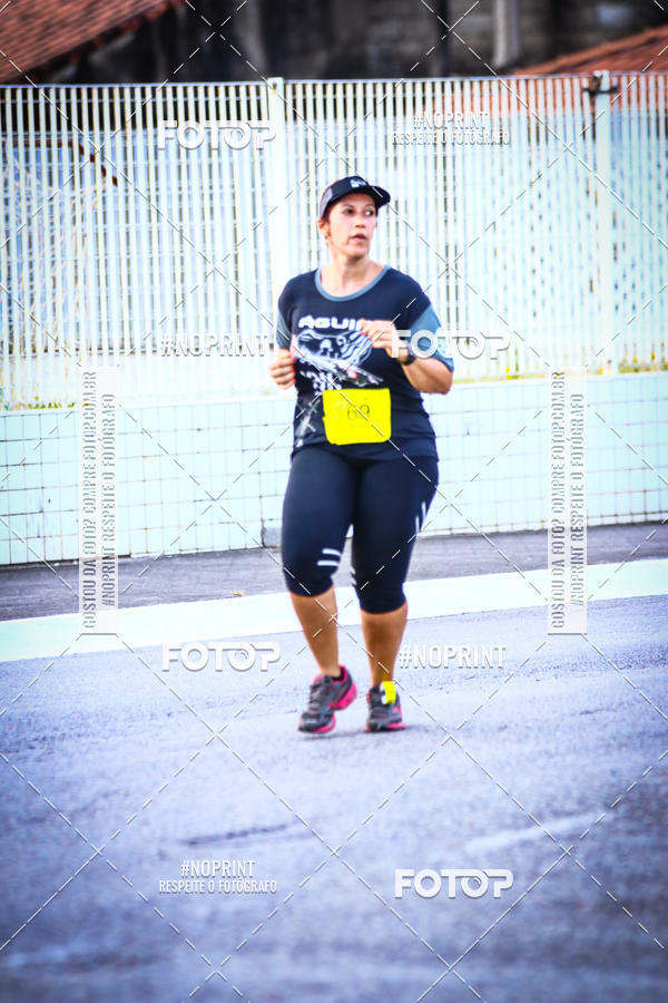 Buy your photos of the eventguia 13K Praia Grande on Fotop