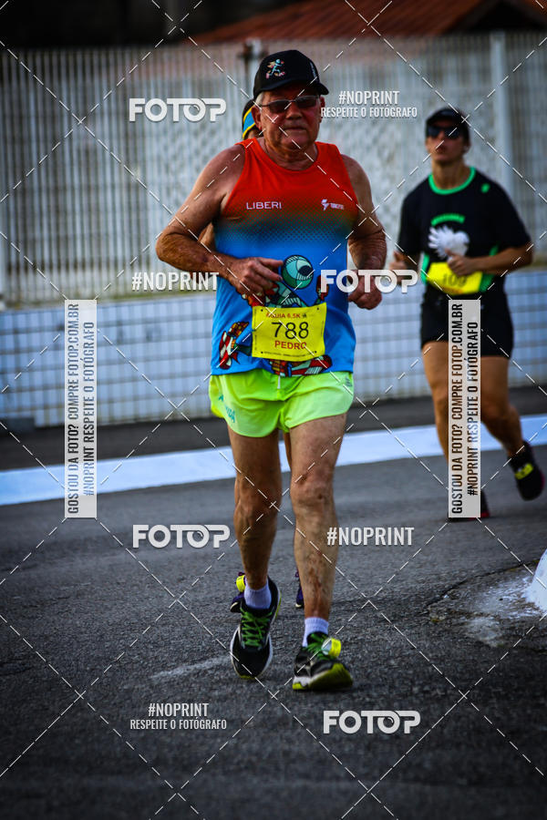 Buy your photos of the eventguia 13K Praia Grande on Fotop