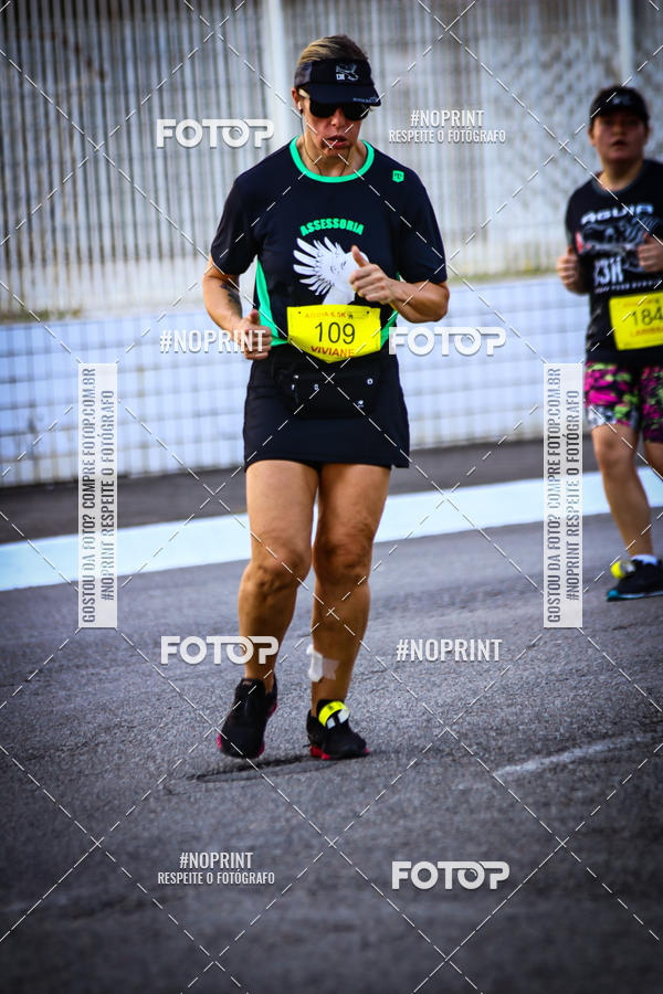 Buy your photos of the eventguia 13K Praia Grande on Fotop