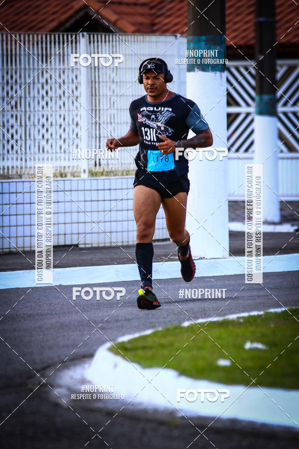 Buy your photos of the eventguia 13K Praia Grande on Fotop