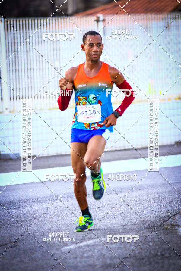 Buy your photos of the eventguia 13K Praia Grande on Fotop
