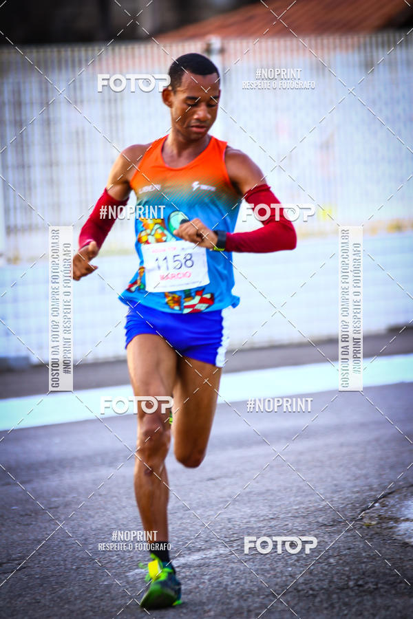 Buy your photos of the eventguia 13K Praia Grande on Fotop
