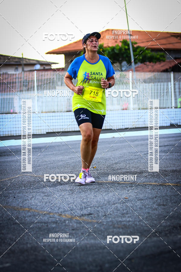 Buy your photos of the eventguia 13K Praia Grande on Fotop