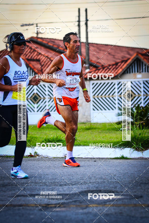 Buy your photos of the eventguia 13K Praia Grande on Fotop