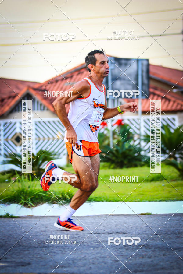 Buy your photos of the eventguia 13K Praia Grande on Fotop