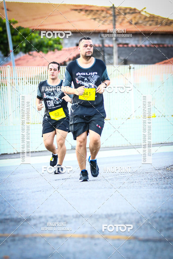 Buy your photos of the eventguia 13K Praia Grande on Fotop