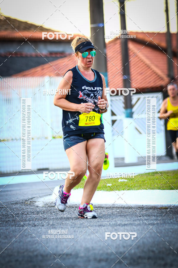 Buy your photos of the eventguia 13K Praia Grande on Fotop