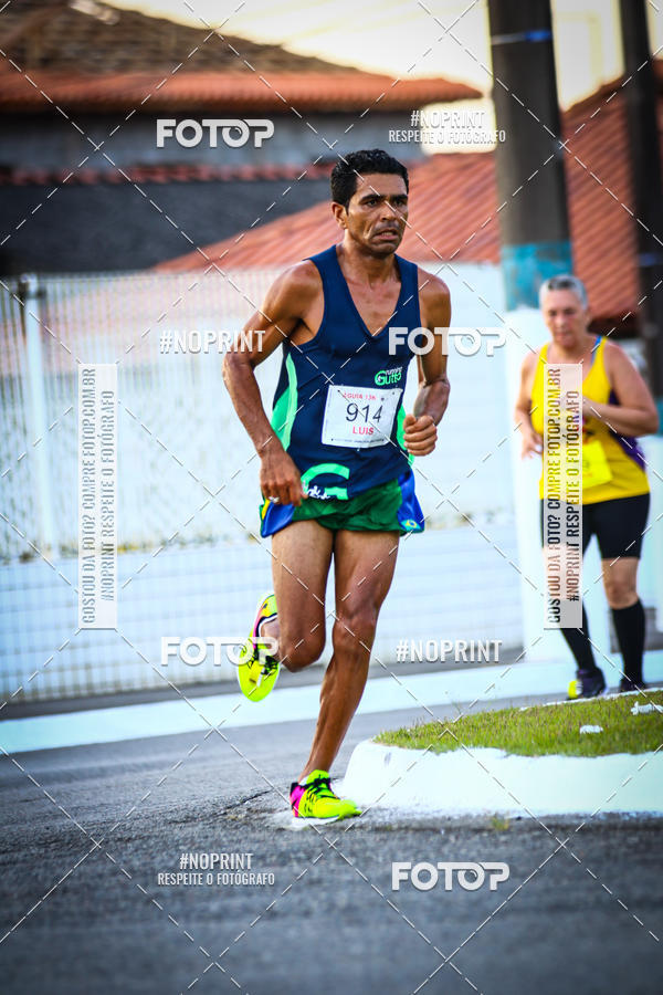Buy your photos of the eventguia 13K Praia Grande on Fotop