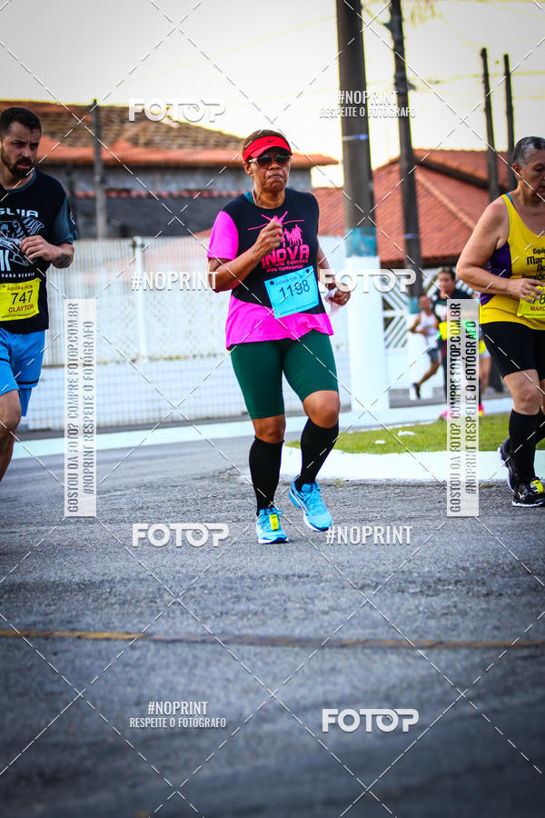 Buy your photos of the eventguia 13K Praia Grande on Fotop