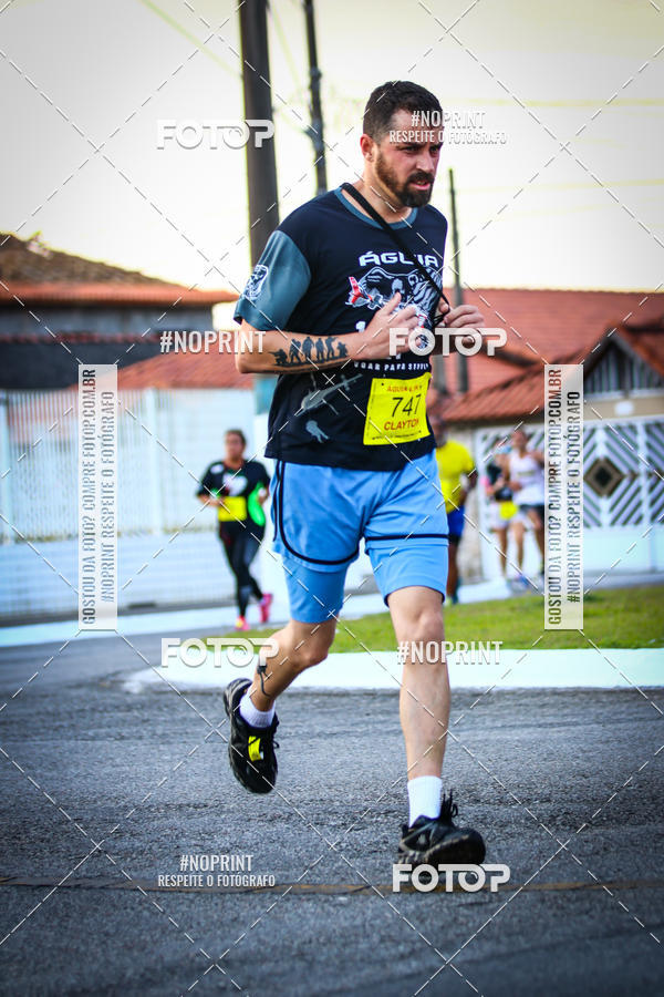 Buy your photos of the eventguia 13K Praia Grande on Fotop