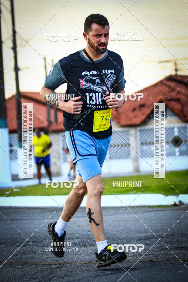 Buy your photos of the eventguia 13K Praia Grande on Fotop