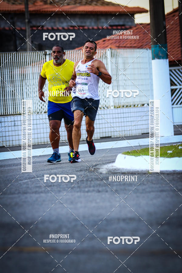 Buy your photos of the eventguia 13K Praia Grande on Fotop