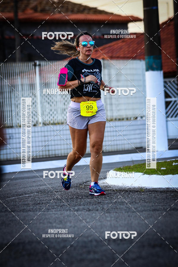 Buy your photos of the eventguia 13K Praia Grande on Fotop