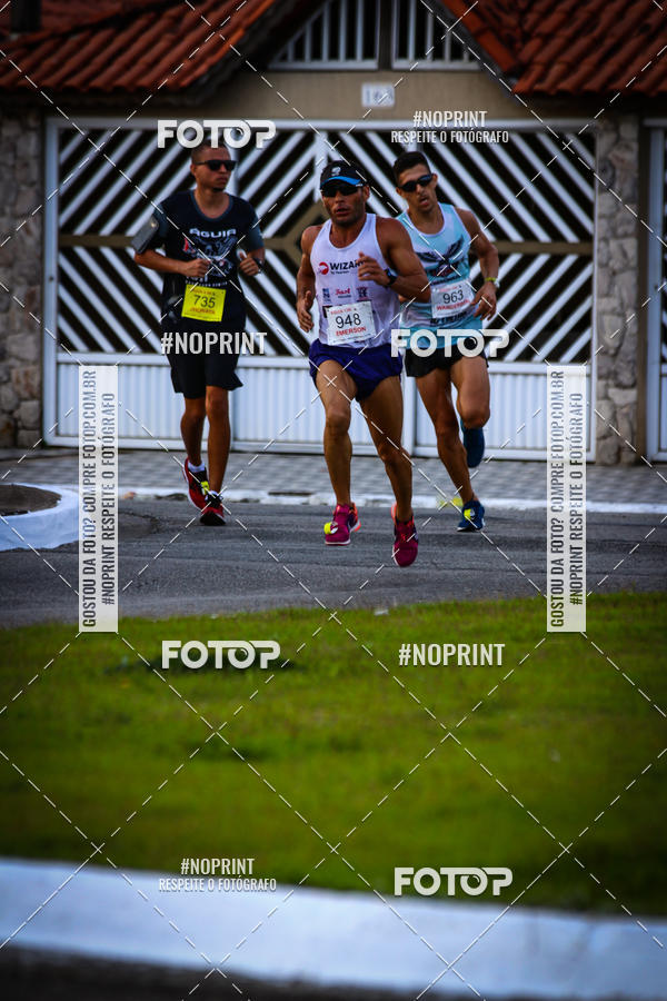 Buy your photos of the eventguia 13K Praia Grande on Fotop