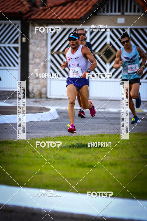 Buy your photos of the eventguia 13K Praia Grande on Fotop