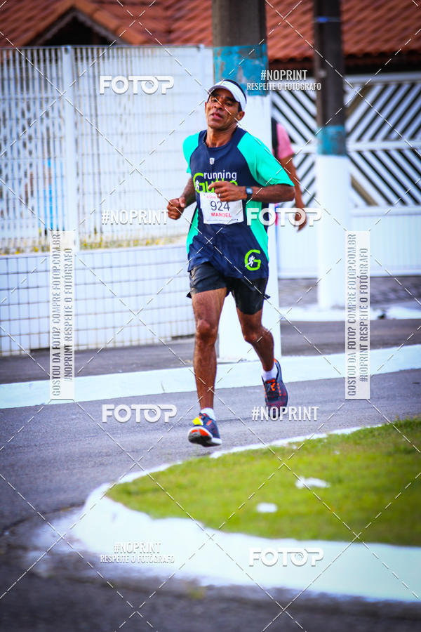 Buy your photos of the eventguia 13K Praia Grande on Fotop
