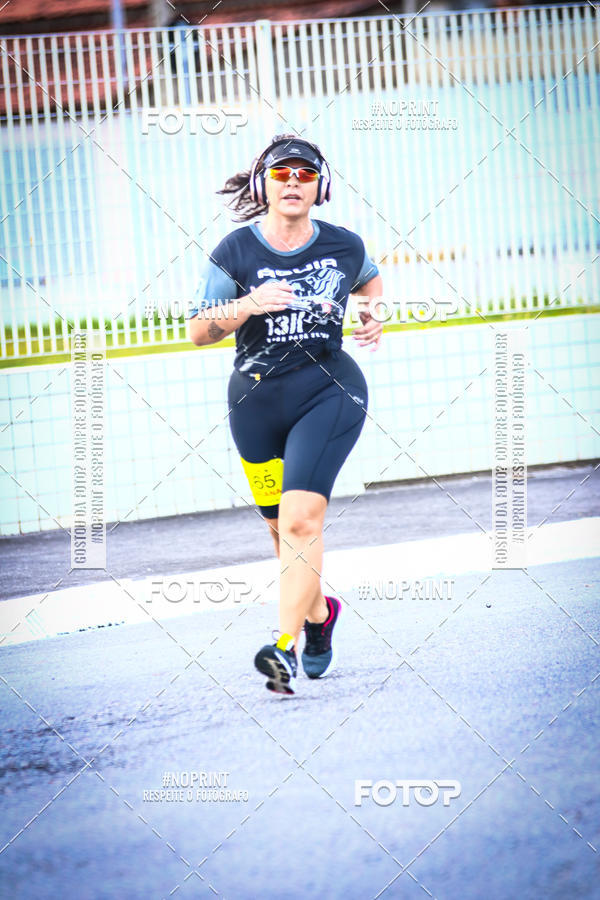 Buy your photos of the eventguia 13K Praia Grande on Fotop