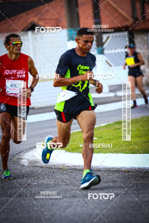 Buy your photos of the eventguia 13K Praia Grande on Fotop