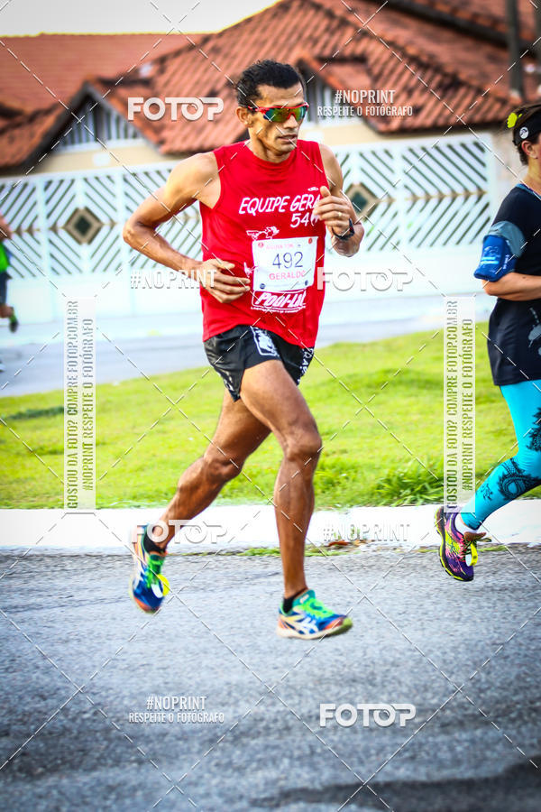 Buy your photos of the eventguia 13K Praia Grande on Fotop