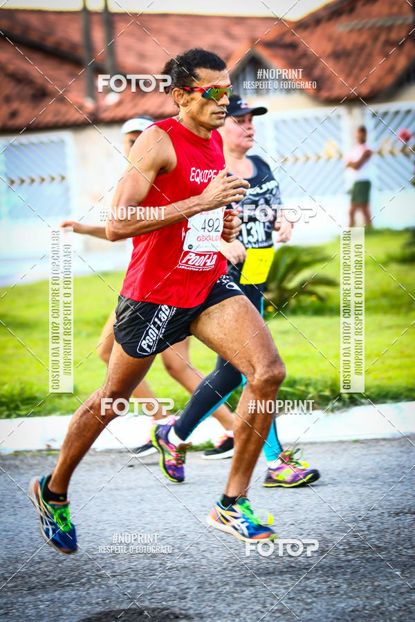 Buy your photos of the eventguia 13K Praia Grande on Fotop