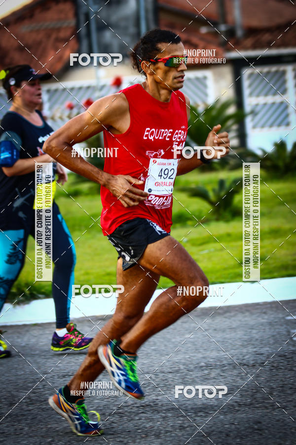 Buy your photos of the eventguia 13K Praia Grande on Fotop