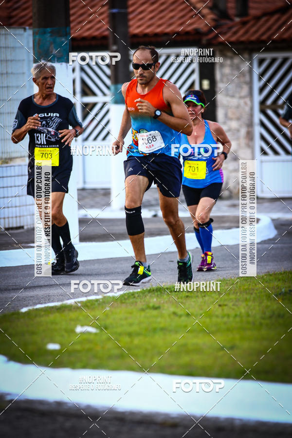 Buy your photos of the eventguia 13K Praia Grande on Fotop