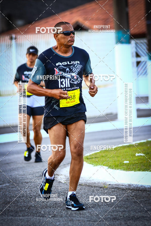 Buy your photos of the eventguia 13K Praia Grande on Fotop