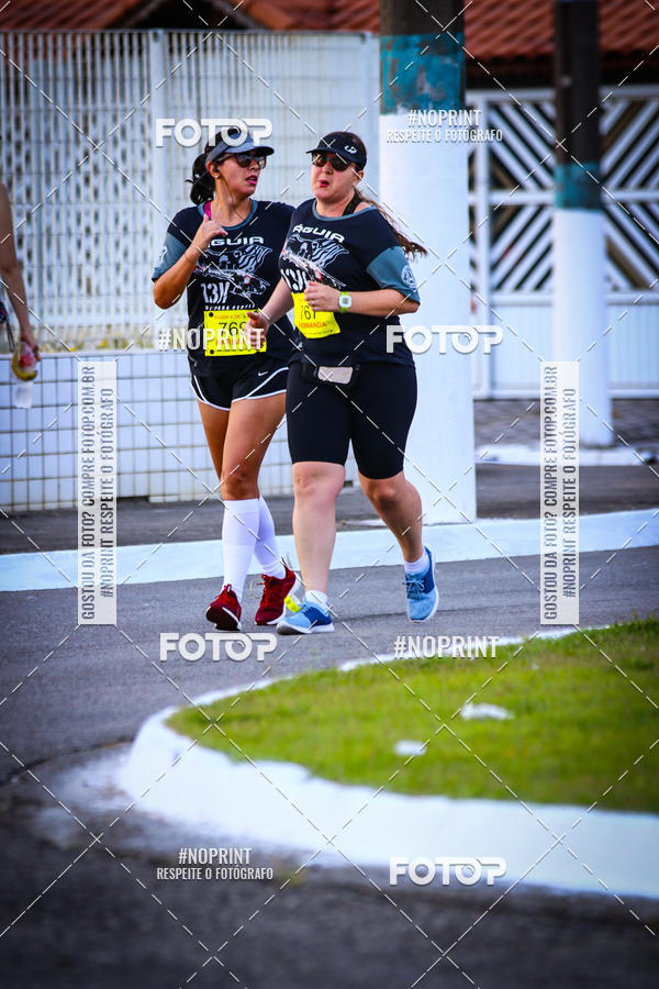 Buy your photos of the eventguia 13K Praia Grande on Fotop