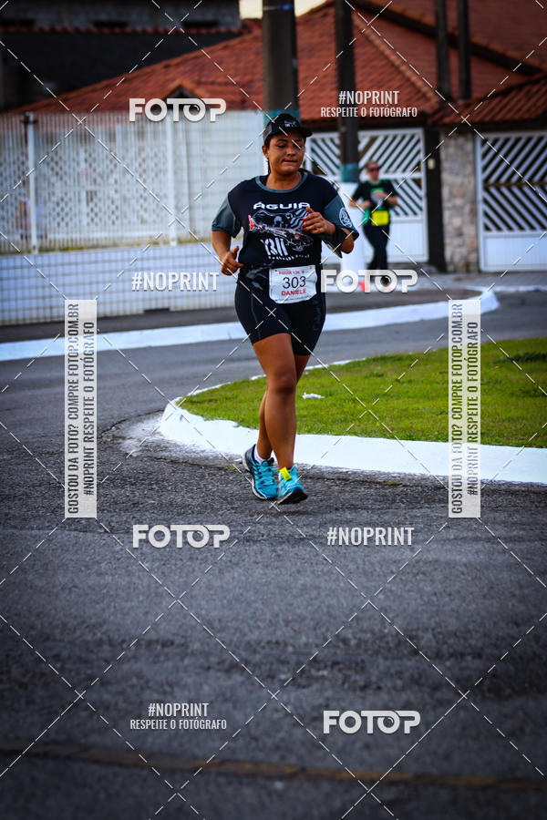 Buy your photos of the eventguia 13K Praia Grande on Fotop