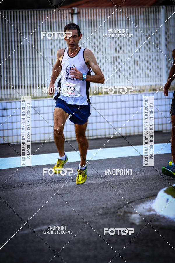 Buy your photos of the eventguia 13K Praia Grande on Fotop