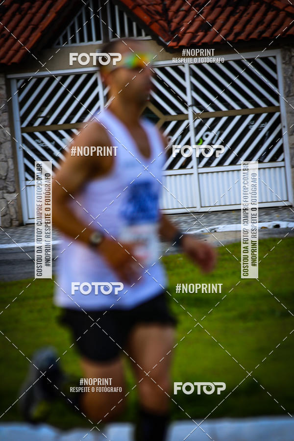 Buy your photos of the eventguia 13K Praia Grande on Fotop